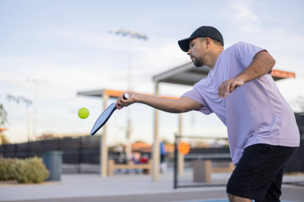 A diverse group meaning playing pickleball